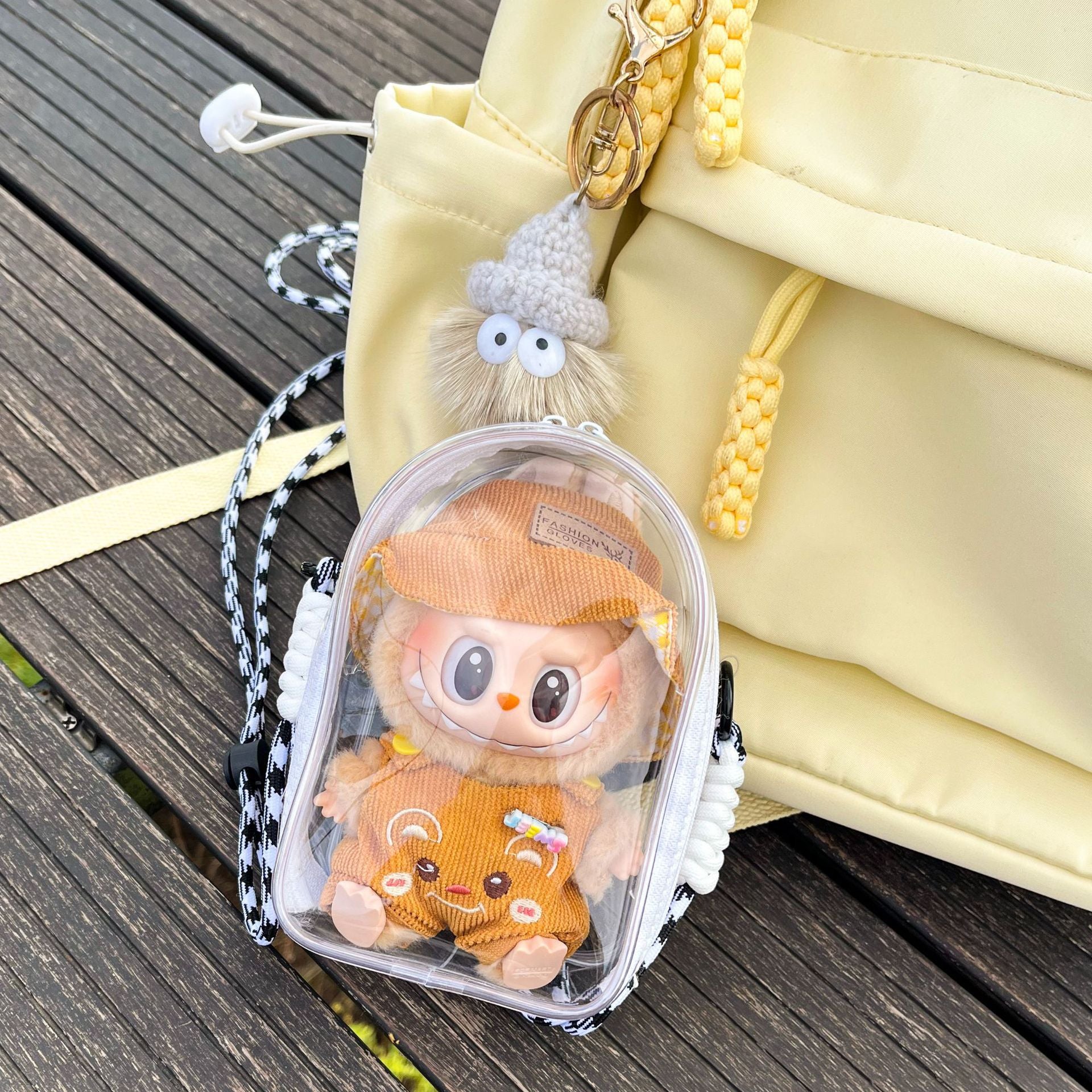 Labubu Is Sitting with a 5.91-Inch Doll Crossbody Cartoon Backpack, a PVC Storage Bag, And Car Curtain Fabric Doll Bag.