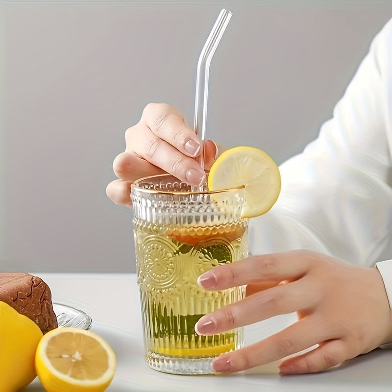 One set of 6 straws + 1 brush. High borosilicate transparent glass straws, heat-resistant, washable and reusable juice straws