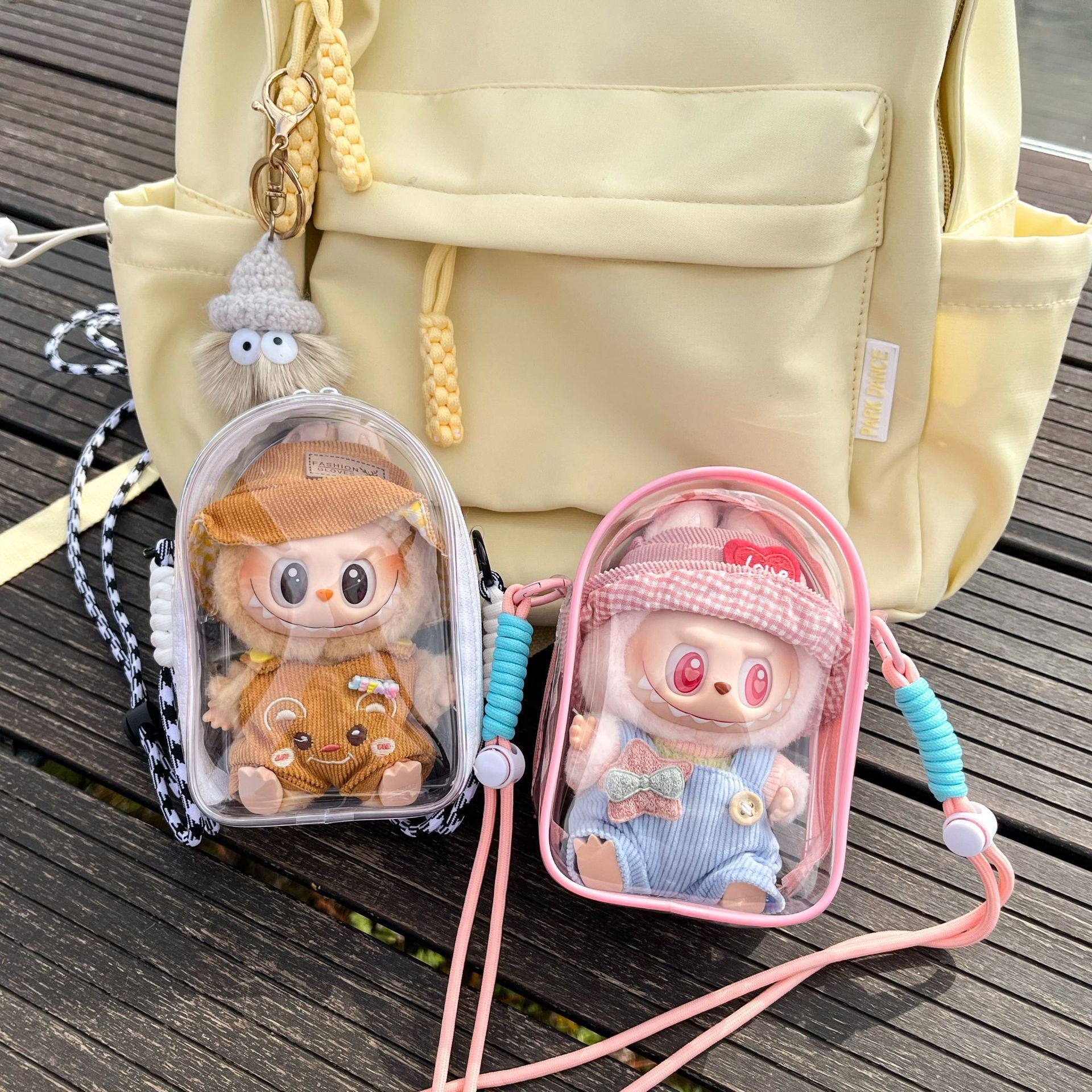 Labubu Is Sitting with a 5.91-Inch Doll Crossbody Cartoon Backpack, a PVC Storage Bag, And Car Curtain Fabric Doll Bag.